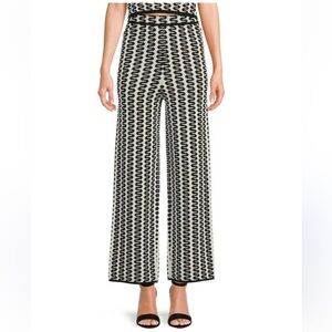 ANTHROPOLOGIE LUCY PARIS TAHITI BLACK CREAM PRINT STRETCHY WIDE LEG PANTS SIZE M